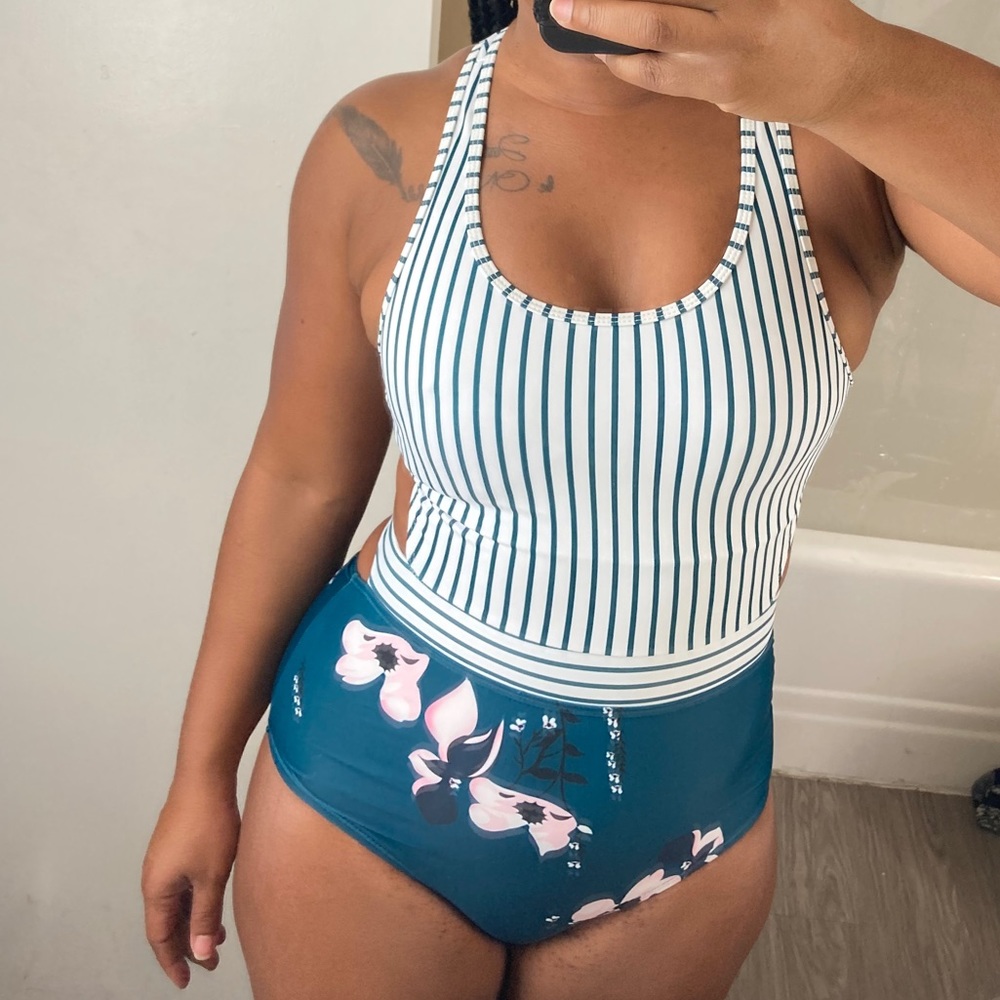 Floral bottom, striped top one piece bathing suit